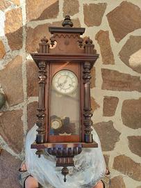 Orologio a pendolo da parete