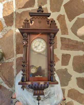 Orologio a pendolo da parete