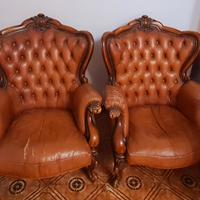 poltrone in pelle e in legno anni 70