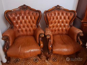 poltrone in pelle e in legno anni 70