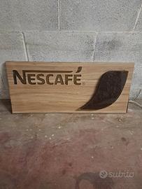 Insegna Nescafè luminosa