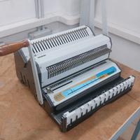 Rilegatrice + set super assortito di spirali