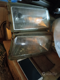 Ricambi alfa 33 Fari 1 2 serie carello fiat uno