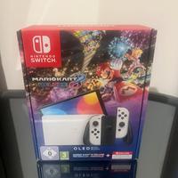 Nintendo Switch oled com MarioKartDeluxe in garanz