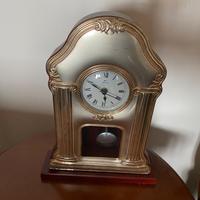 Orologio a pendolo in argento