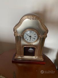 Orologio a pendolo in argento