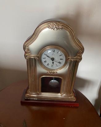 Orologio a pendolo in argento