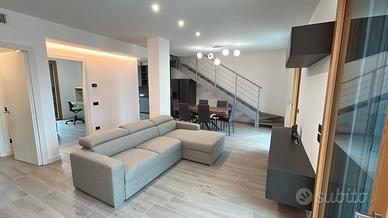 Divano a penisola e/o mobile di soggiorno