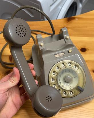 Telefono vintage cornetta con filo da collezione