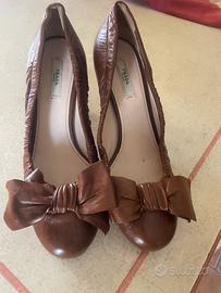 Scarpe tacchetto con fiocco Prada