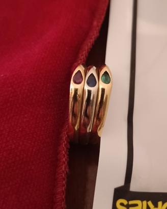 Tris anelli oro 750 con pietre preziose 