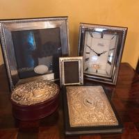 Cornice orologio argento