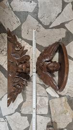 antichi putti alati in legno intaglisto