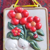 Formelle in terracotta con gattini