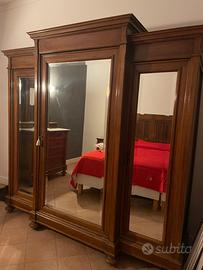 Camera da letto in legno in stile completa