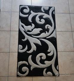 Tappeto bianco e nero 