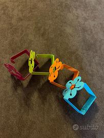 Fermatovaglia colorati a forma di fiore