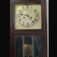 Orologio a pendolo da muro