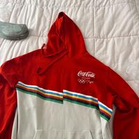 Felpa Coca-Cola olimpiadi 2026