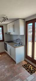 CASSIA BILOCALE ARREDATo CON TERRAZZO PERIMETRALE