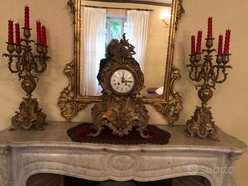 Trittico con orologio e due candelabri XIX secolo