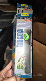 Riscaldatore e mangiatoia x acquario