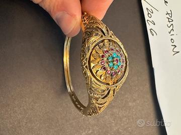 Orologio gioiello con pietre preziose oro