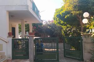Casa con giardino