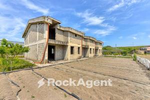 FABBRICATO ALLO STATO GREZZO E TERRENI ANNESSI