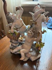 Gruppo in porcellana Capodimonte 3 putti musicanti