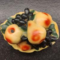 Salvadanaio decò tipo portafrutta