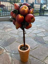 Vaso di coccio con frutta