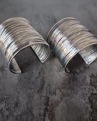 Coppia Bracciali Rigidi regolabili a Molla 