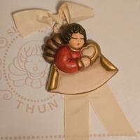 Angelo con cuore e targhetta Thun