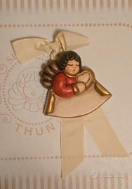 Angelo con cuore e targhetta Thun