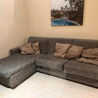 Divano letto con penisola contenitore