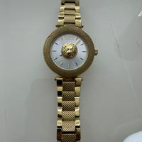 Orologio Versus Versace dorato con leone