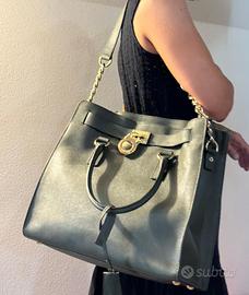 Borsa Michael Kors verde scuro e oro