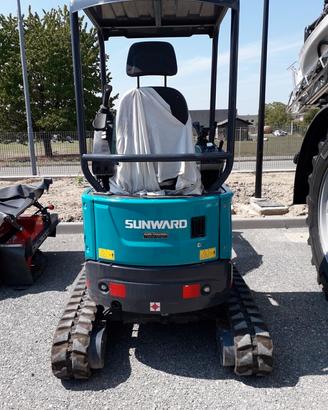 escavatore aratro attrezzi
