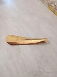 Calzascarpe vintage Bruno Magli in ottone