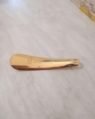 Calzascarpe vintage Bruno Magli in ottone