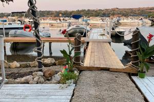 Approdo Di Brucoli. Posto barca pontile/boa