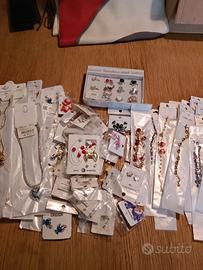 lotto 100 pezzi bigiotteria misti 