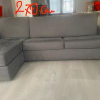 Divano letto con penisola contenitore reversibile