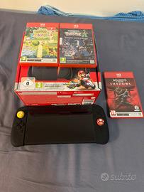 switch 2+scheda memoria e 3 giochi