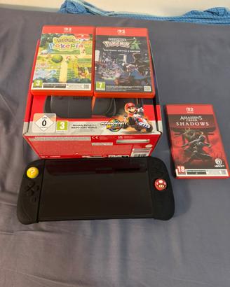 switch 2+scheda memoria e 3 giochi