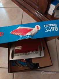 Router Fritz box 3490+access point unifi 