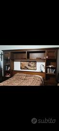 Letto matrimoniale con struttura libreria