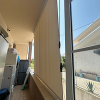 Tenda da sole con bracci beige