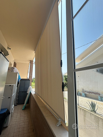 Tenda da sole con bracci beige